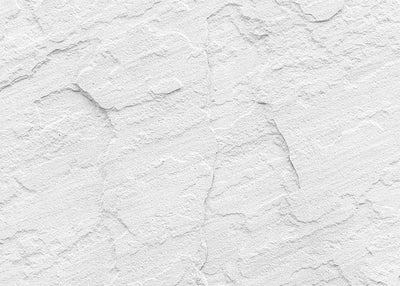 Protège-plaque à induction  - Mur blanc stuc