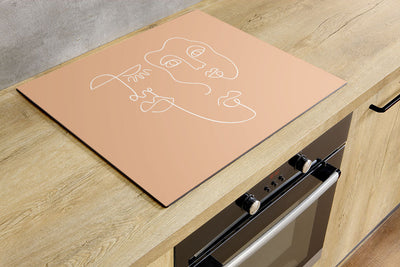 Protège-plaque à induction - Visages multiples